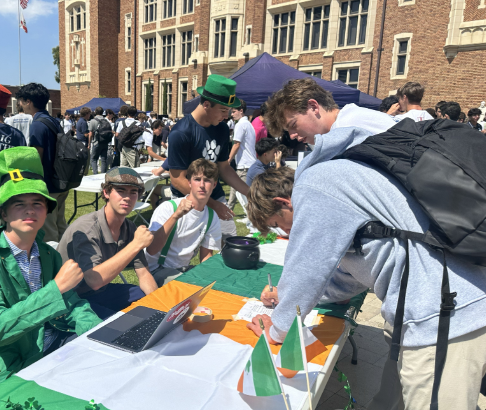 Tucker Sweeney '25, Crowley Sullivan '25 And Finn O'Donnell '25 Staff The Irish Club Booth